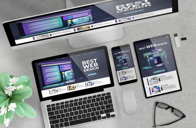 business website displayed on laptop, tablet and smartphone showing responsive design and digital marketing strategy
